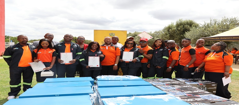 Acting Head of Department together with the Artisans during the awarding of the certificate and handing of tools 